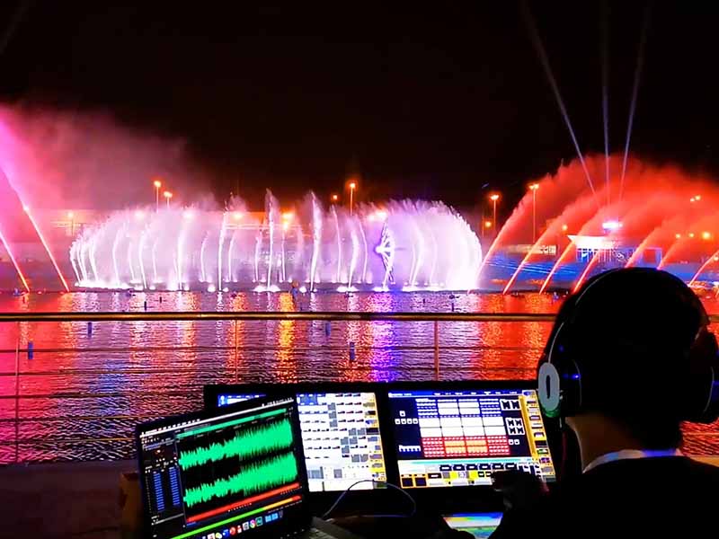 Colorful fountain show at night