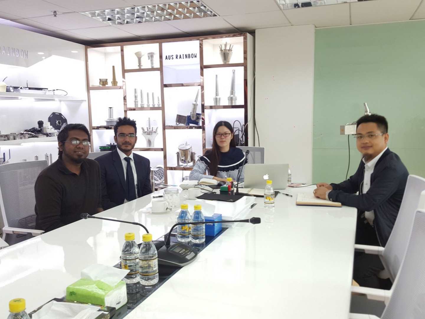 Business meeting in modern office setting.