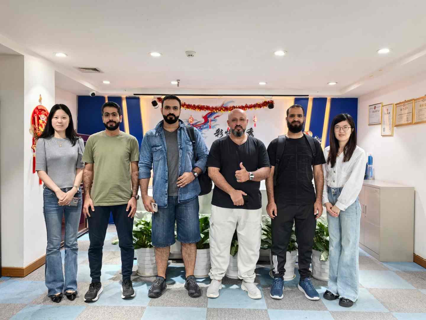 group photo of Omani customer SAID